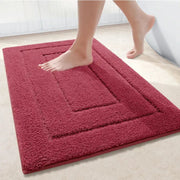 Plush tapis de bain framboise rectangulaire en velours à boucle avec bord embossé pour un ensemble coordonné élégant