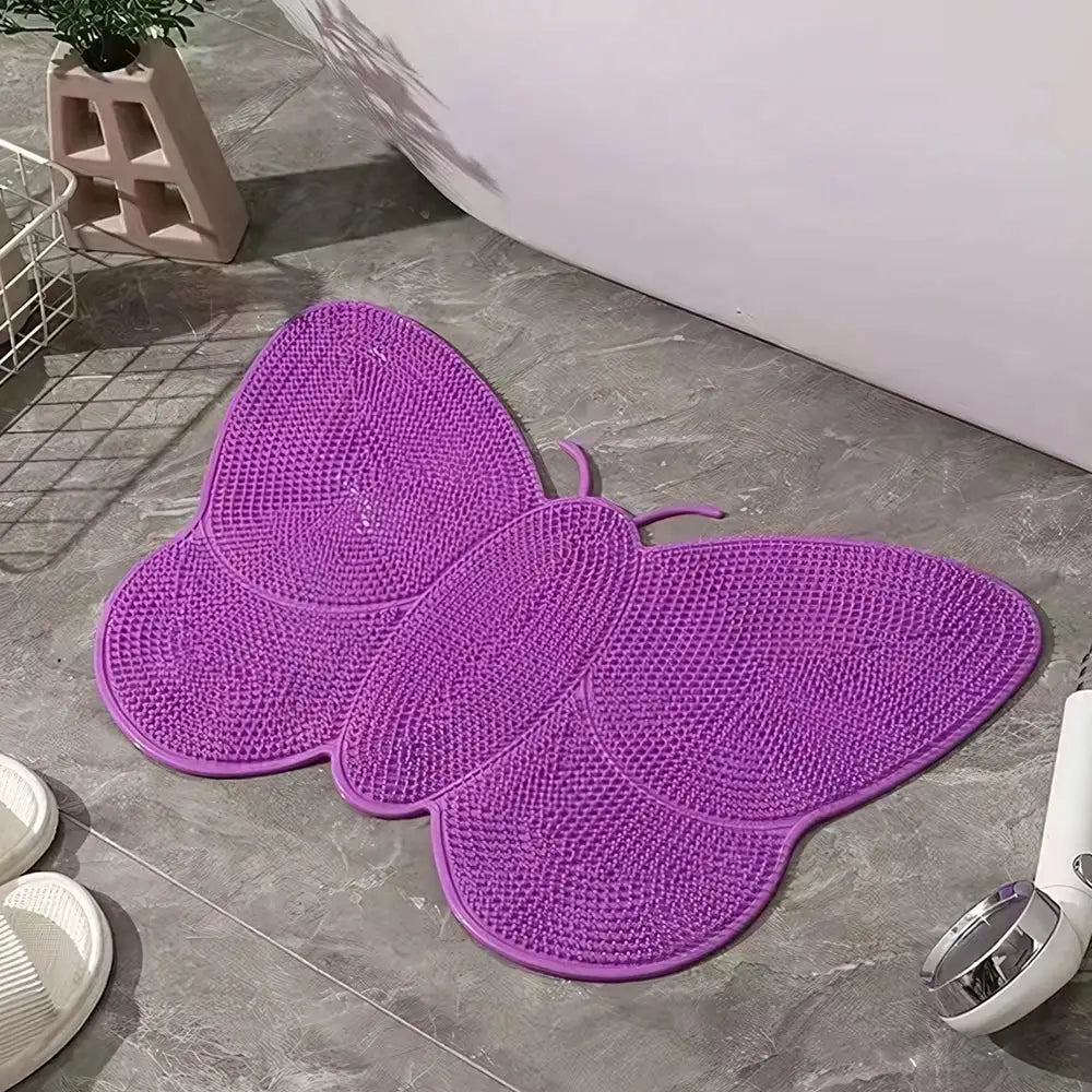 Tapis de bain en forme de papillon violet avec une surface texturée en forme de grille.