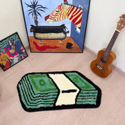 Tapis d’argent vert et blanc avec bordure noire, design tissé.