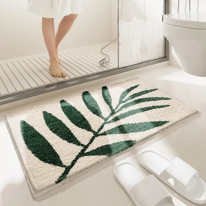 Tapis de bain blanc avec motif de feuille verte, matériau microfibre.