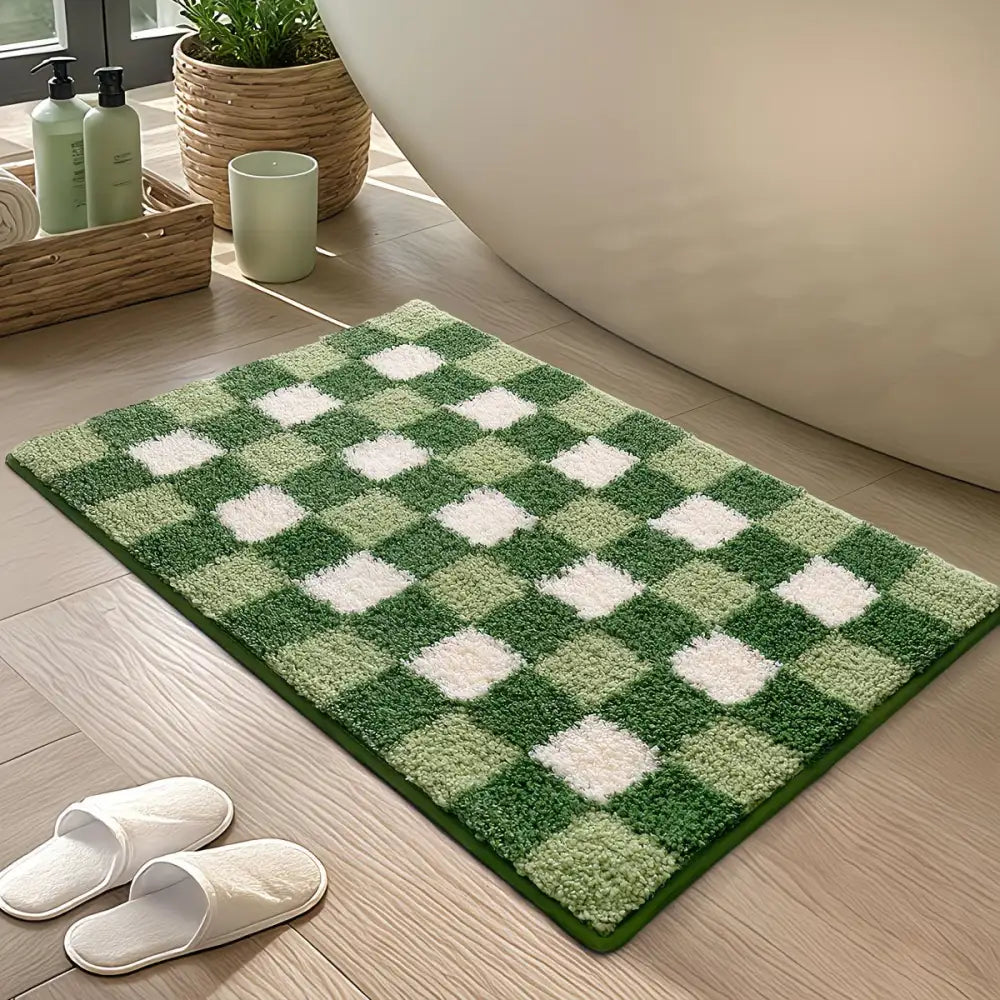 Tapis de bain à carreaux verts et blancs avec une texture moelleuse et duveteuse.