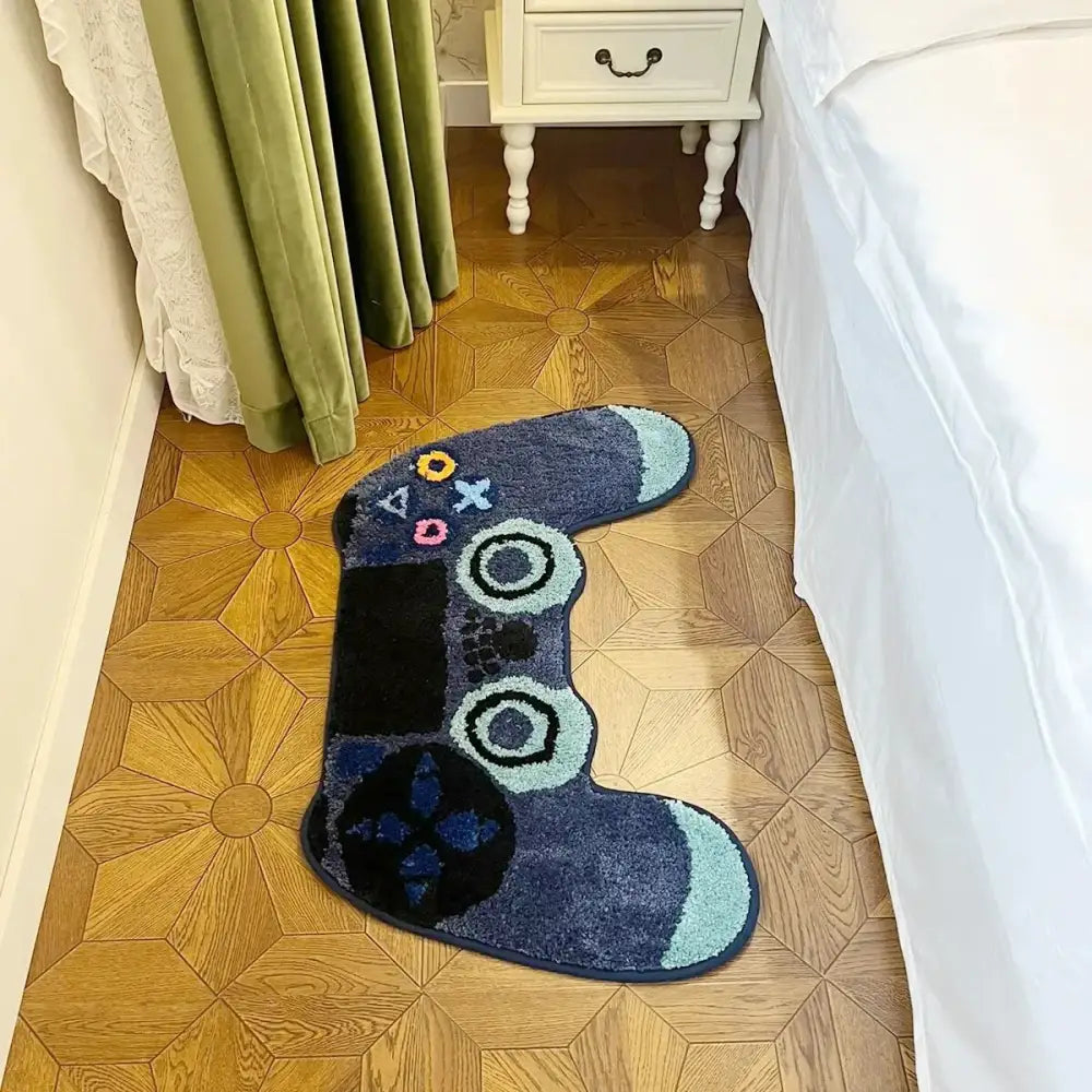 Tapis pour contrôleur PlayStation bleu et noir avec velours texturé.
