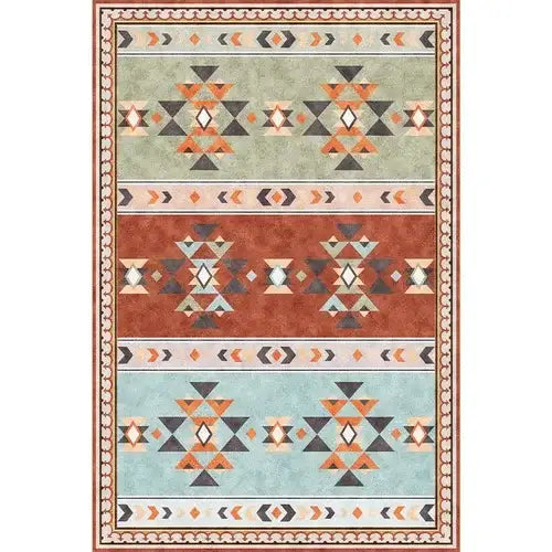 Tapis navajo rectangulaire avec palette de couleurs terreuses incluant sage vert, terracotta et bleu ciel avec motifs ethniques