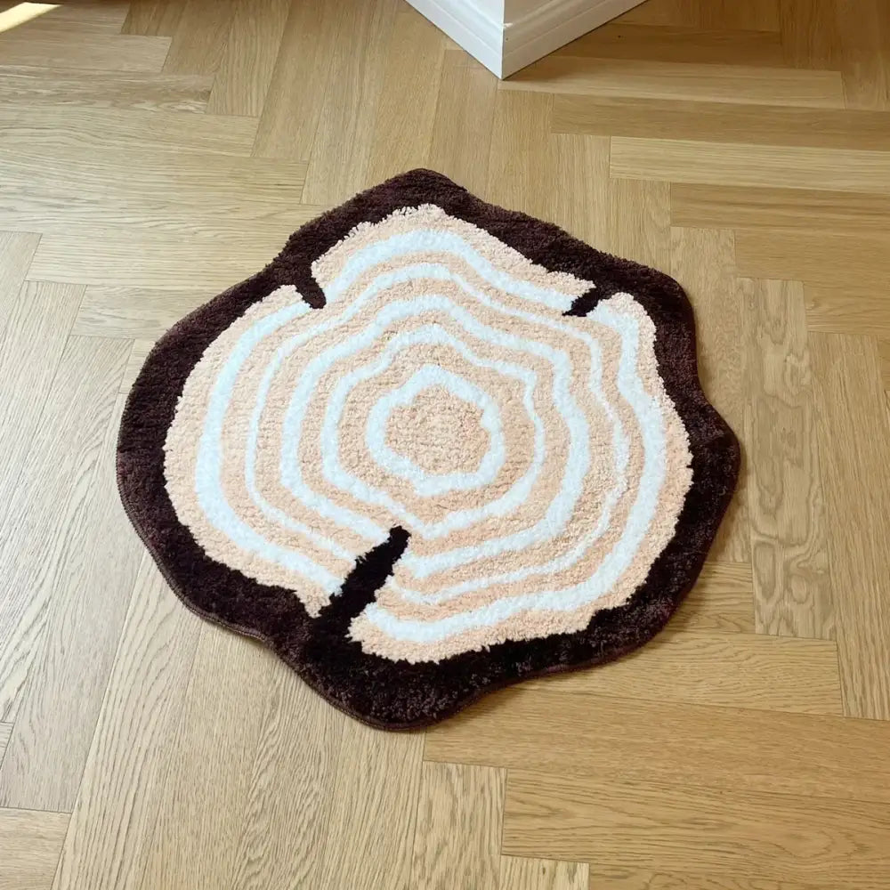 Tapis tronc d’arbre rond en laine marron et crème avec support caoutchouc antidérapant
