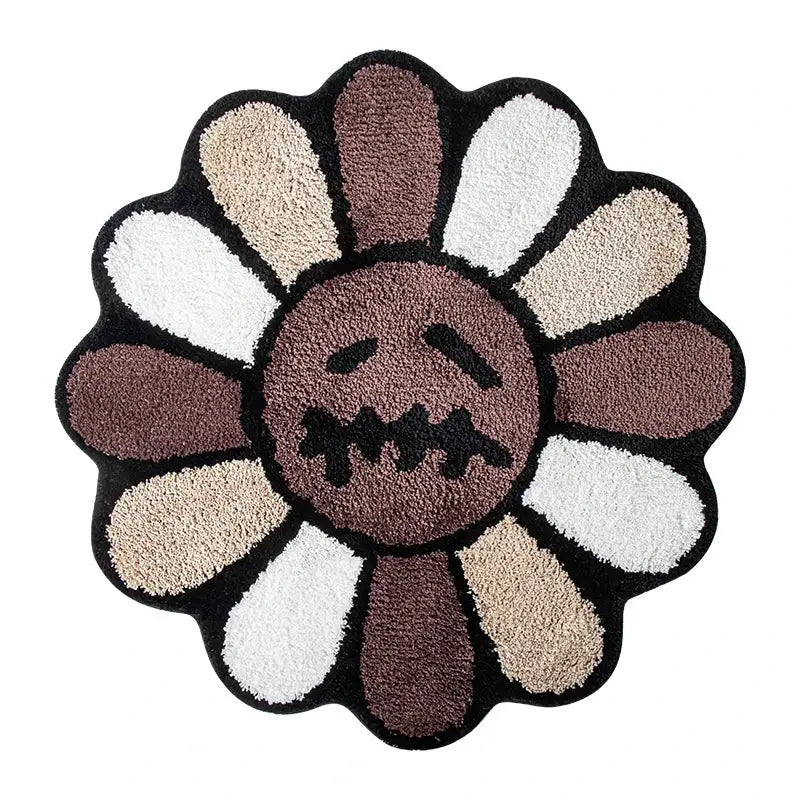 Tapis de bain brun et blanc en forme de fleur avec un design de visage délabré, fabriqué en matériau moelleux.