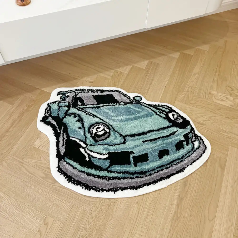Tapis Porsche 911 bleu avec accents noir et blanc, matériau moelleux.