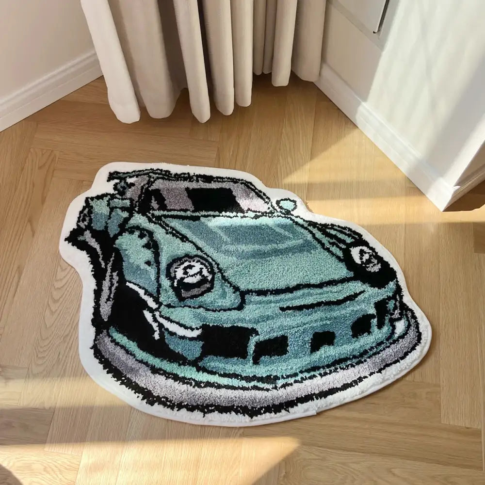 Tapis Porsche turquoise avec bordure blanche et accents noirs.